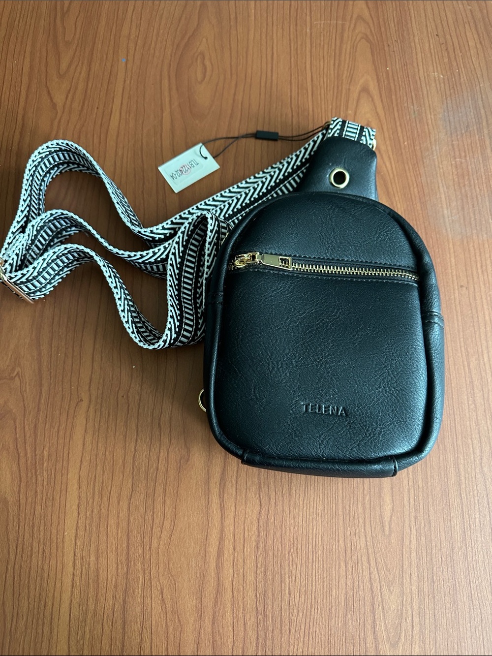 Black Sling Belt Bag with Patterned Strap NWT, never used
